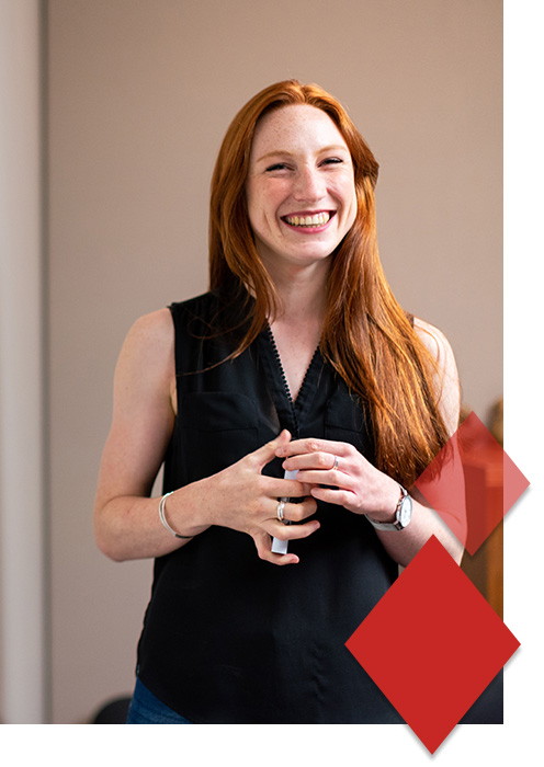 Woman holding a dry erase marker