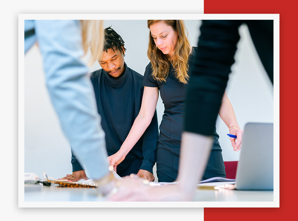 Group of professionals working at a table