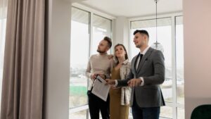 leasing specialist working with couple